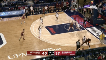LOOK: College basketball game stopped after delivery man walks onto