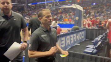 WATCH: Arkansas basketball staffer appears to slam photographer’s phone to
