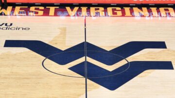 West Virginia F Akok Akok hospitalized, in stable condition after